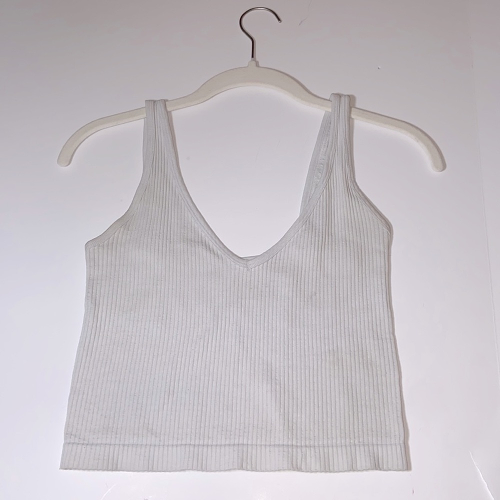 Light grey thick strapped tank top.
